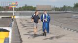 Bryan Geist and his son, Palmerton graduate Trent, walk along pit row before Palmerton’s graduation ceremony at Pocono Raceway.