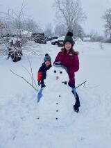 Grace Neff,8, and Everett Neff, 4, built a snowman in Lower Towamensing Township. MARCY NEFF PHOTO
