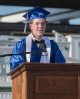 Class President Mitchell Hourt welcomes guests to Palmerton 2020 commencement exercise at Pocono Raceway.