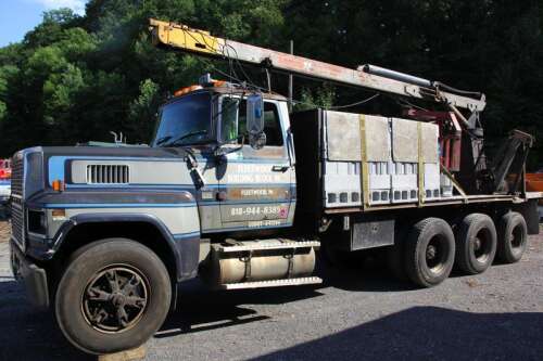 Raised boom truck downs utility lines along SR309 – Times News Online