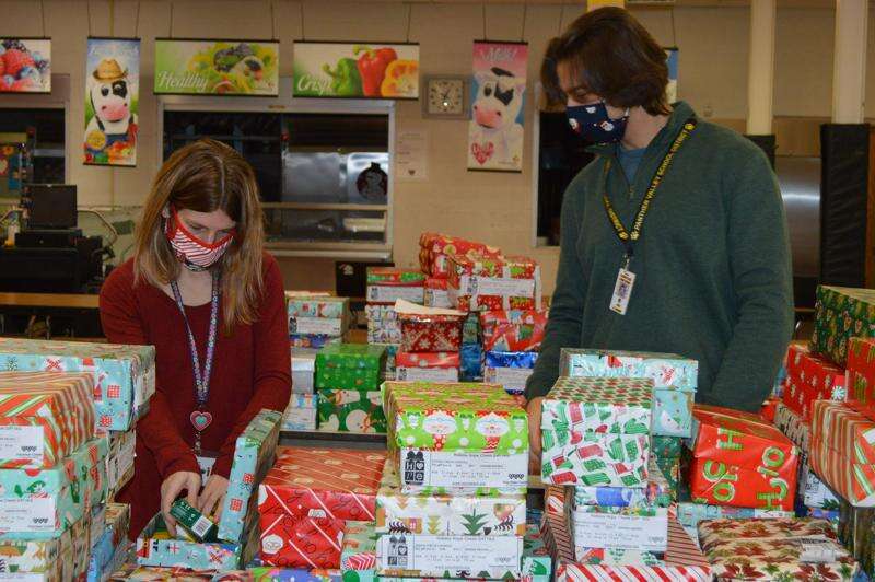 Panther Valley Elementary School staff give gifts to students Times
