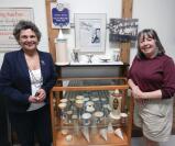 2016: Garofalo and Martha Capwell Fox, Museum &amp; Archives Coordinator (right) show off a collection of Dixie Cups that were staples of the once thriving soda fountain scene.