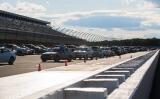Car line up on the track at Pocono Raceway before Palmerton’s graduation.