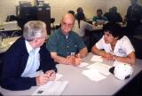 2002: Discussing Jim Thorpe´s strengths and weaknesses during a community visioning workshop on Sunday were (l-r) residents Bob Marzen and John Meckes, and Garofalo.