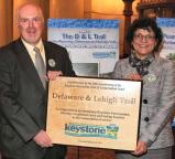 2013: Garofalo, right, and D&amp;L Trail Manager Scott Everett hold the Keystone Fund award at the State Capitol Rotunda celebration held March 18.