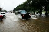 Cars go through a foot of water on Delaware Avenue. COPYRIGHT LARRY NEFF/SPECIAL TO THE TIMES NEWS